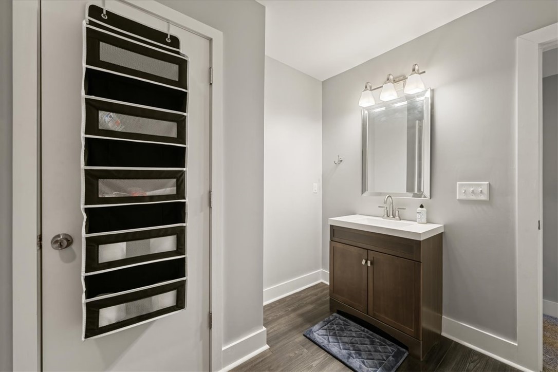 212 Winding Lane Seneca, SC 29672 - Photo 26 of 47 This sleek bathroom features a modern vanity with ample storage, complementing the contemporary design.