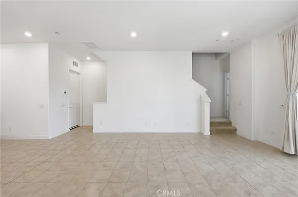 a bathroom with a shower sink and mirror