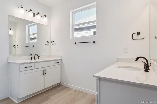 a bathroom with a tub and shower