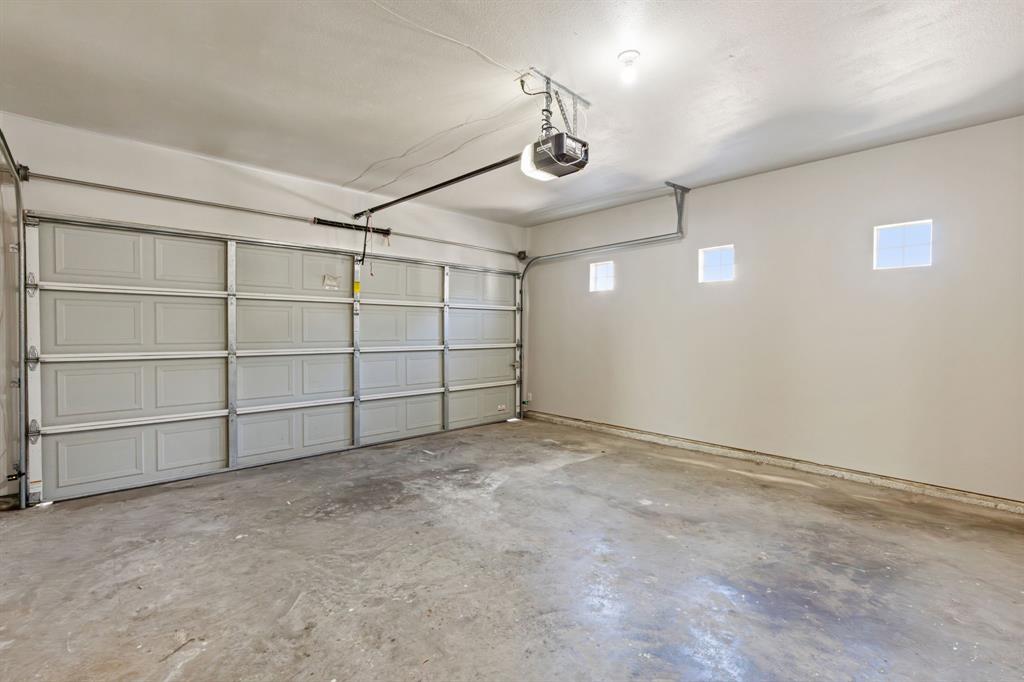 706 South Jupiter Road, Unit 307 Allen, TX 75002 - Photo 31 of 32 2 car garage