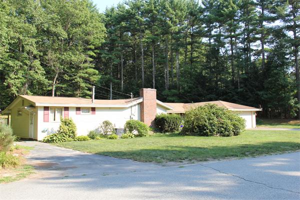 8 Gary Road Chelmsford, MA 01824 - Photo 1 of 17 a front view of a house with garden