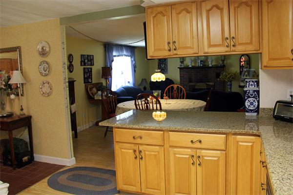 8 Gary Road Chelmsford, MA 01824 - Photo 5 of 17 a kitchen with a sink and cabinets