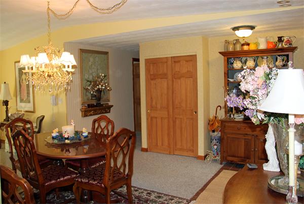 8 Gary Road Chelmsford, MA 01824 - Photo 8 of 17 a view of a dining room with furniture and chandelier