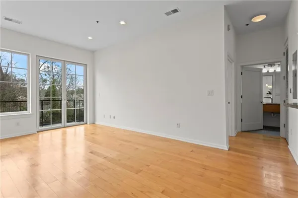 a view of an empty room with a window