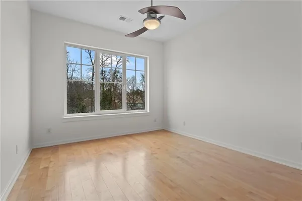 a bathroom with kitchen countertop a sink and a mirror