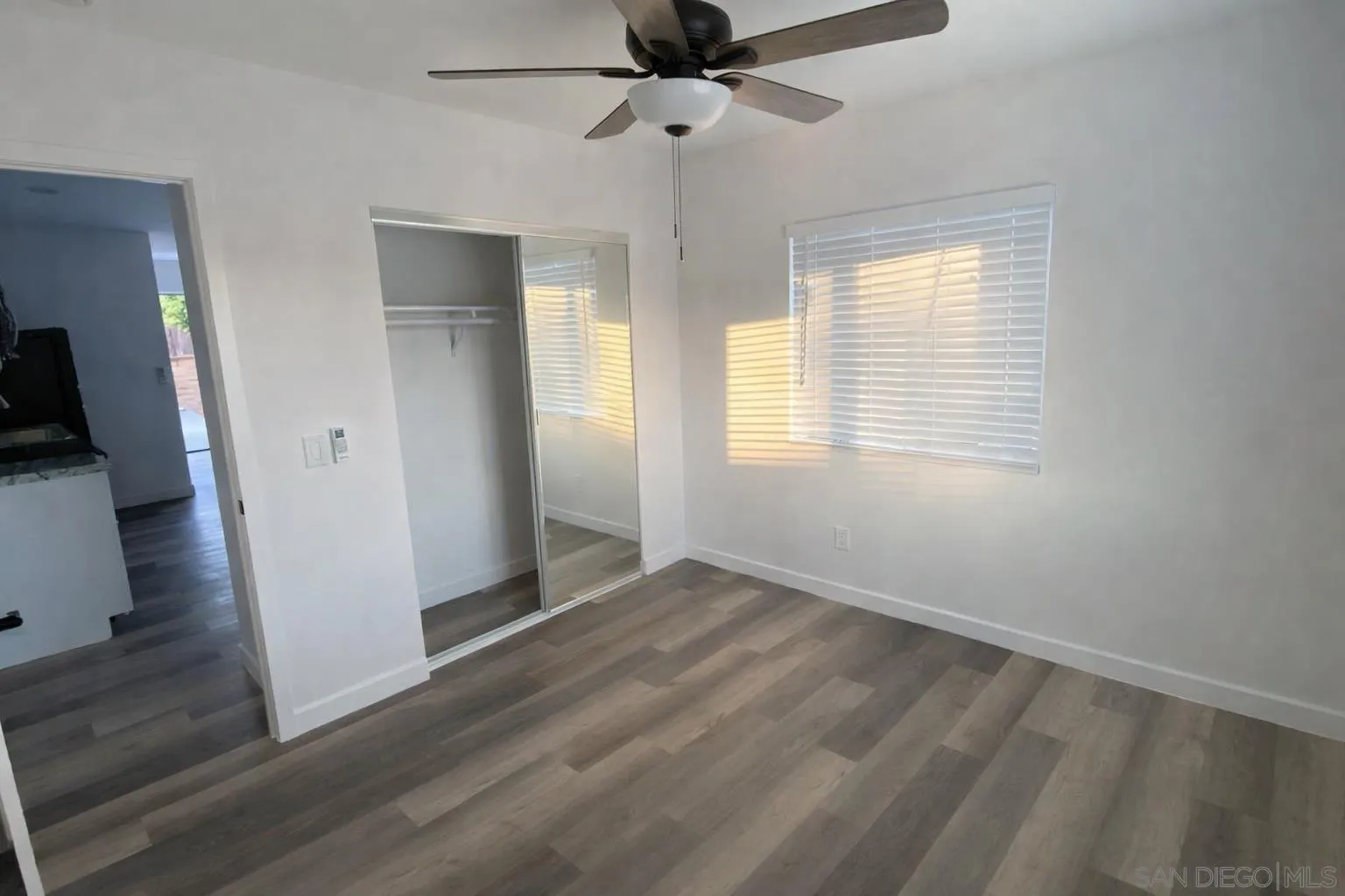 636 Aster Street Escondido, CA 92027 - Photo 7 of 8 a view of an empty room with a window