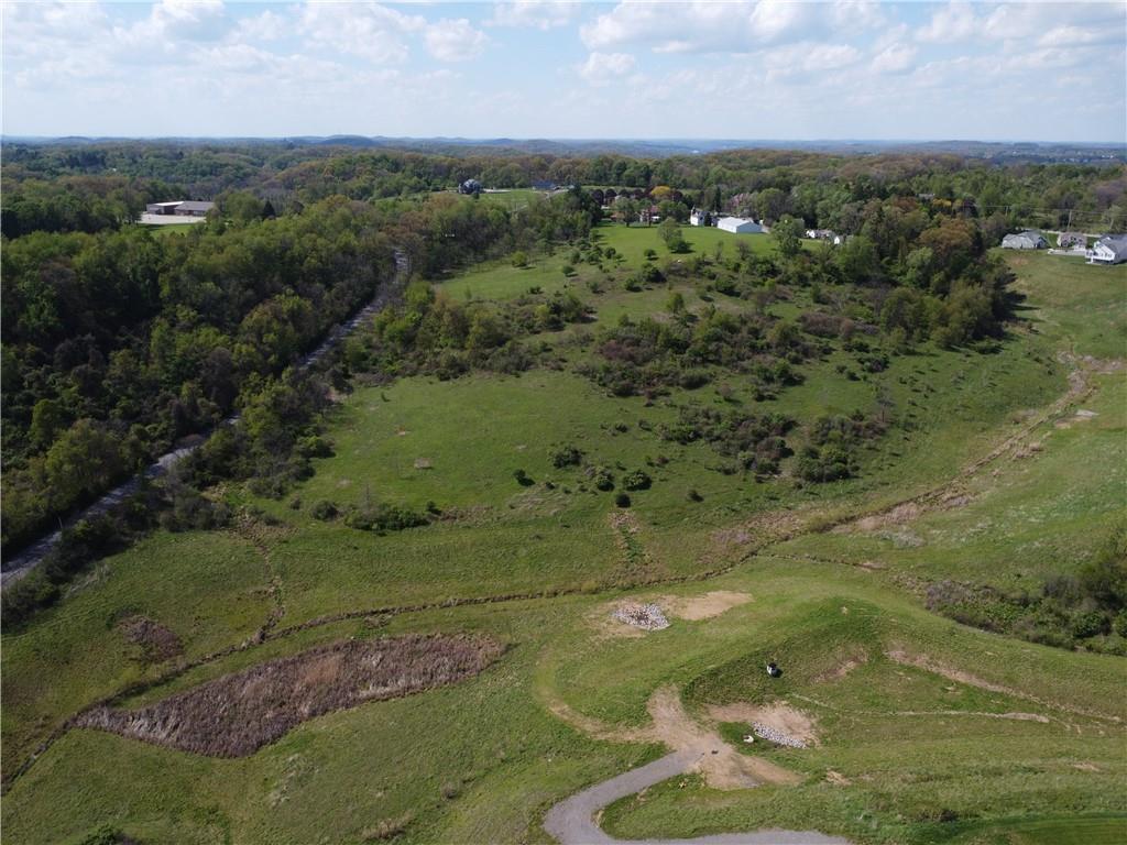 5692 North Montour Road Gibsonia, PA 15044 - Photo 5 of 6 an aerial view of a houses with outdoor space