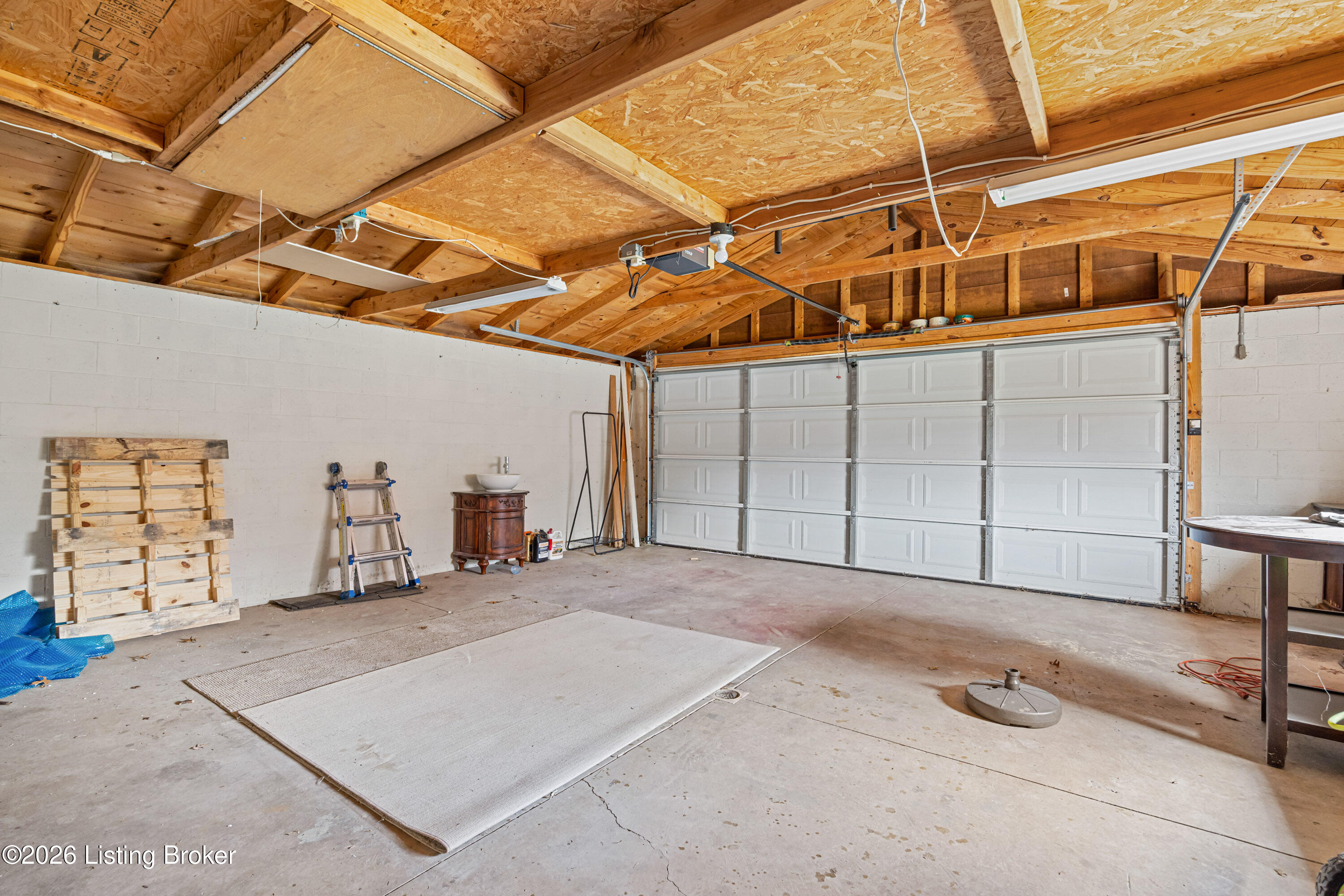 6908 Ledgerock Road Louisville, KY 40219 - Photo 29 of 32 Garage -storage above