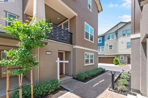 a front view of a house with outdoor space