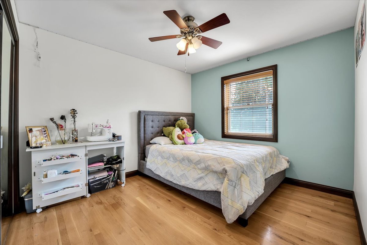 9N576 Crawford Road Elgin, IL 60124 - Photo 16 of 43 a bedroom with a bed and a window