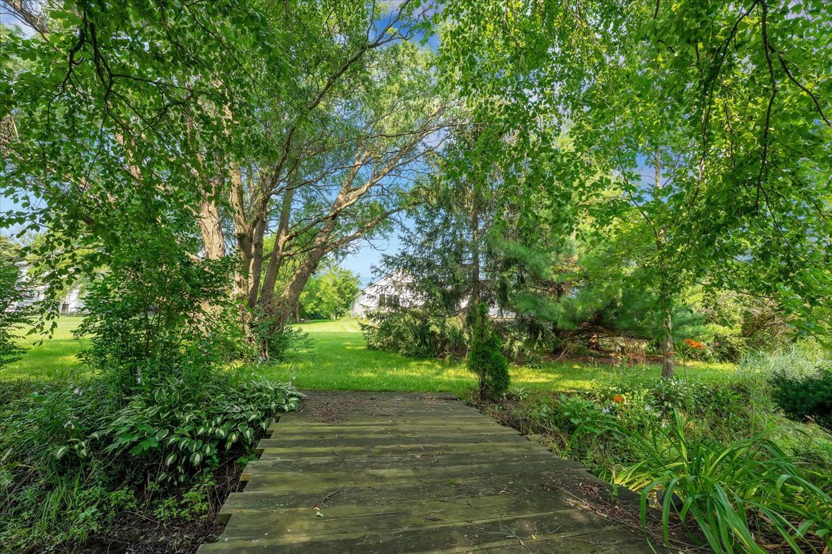 9N576 Crawford Road Elgin, IL 60124 - Photo 28 of 43 a view of a yard with plants and trees
