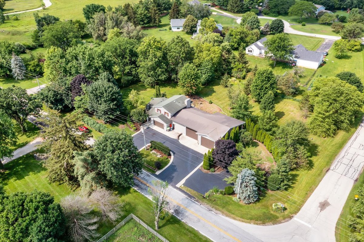 9N576 Crawford Road Elgin, IL 60124 - Photo 32 of 43 an aerial view of residential house with outdoor space and trees all around