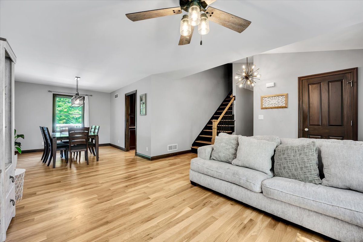 9N576 Crawford Road Elgin, IL 60124 - Photo 5 of 43 a living room with furniture and wooden floor