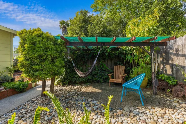 a garden view with a seating space