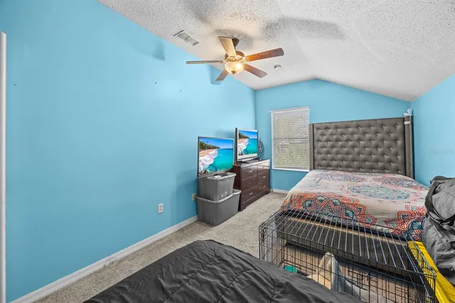 a bathroom with a sink toilet and a mirror