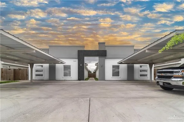 a view of a car in front of house