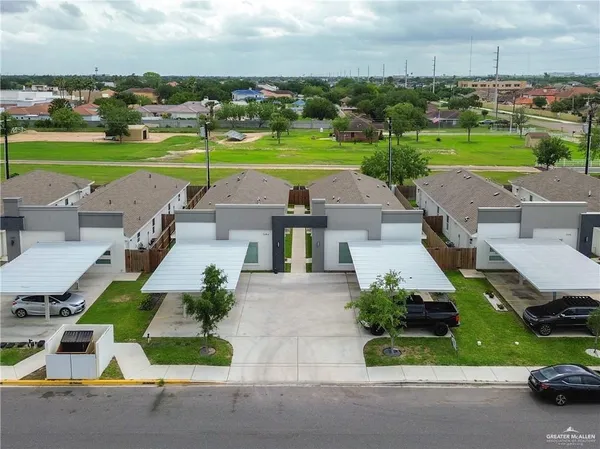 an aerial view of a house with a garden