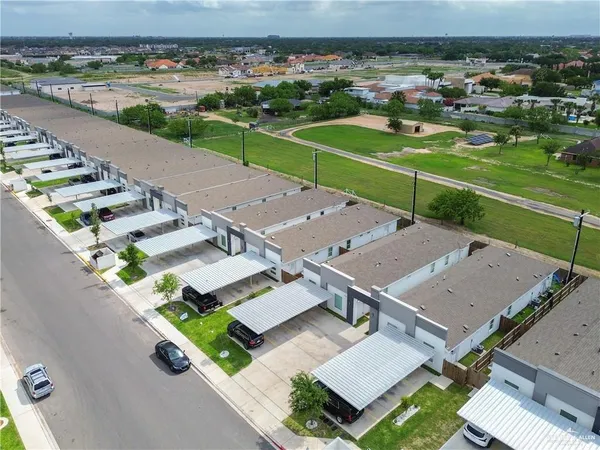 an aerial view of a house with a garden