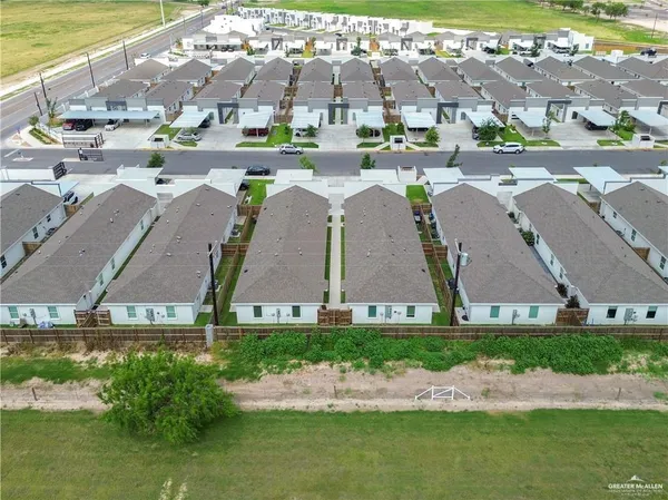 a aerial view of a yard with chairs