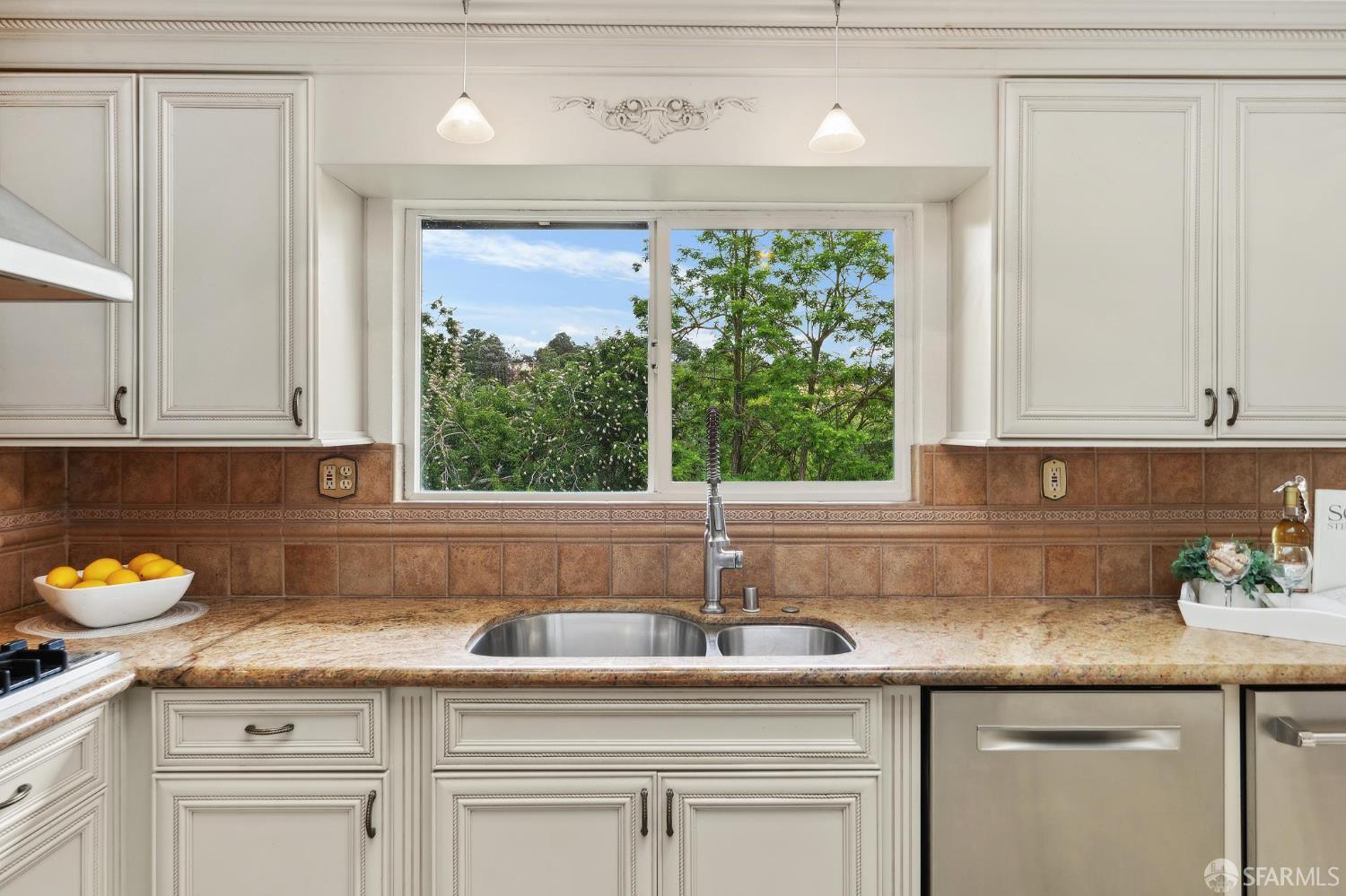 375 Montecillo Drive Walnut Creek, CA 94595 - Photo 22 of 79 a kitchen with stainless steel appliances granite countertop a sink and a window