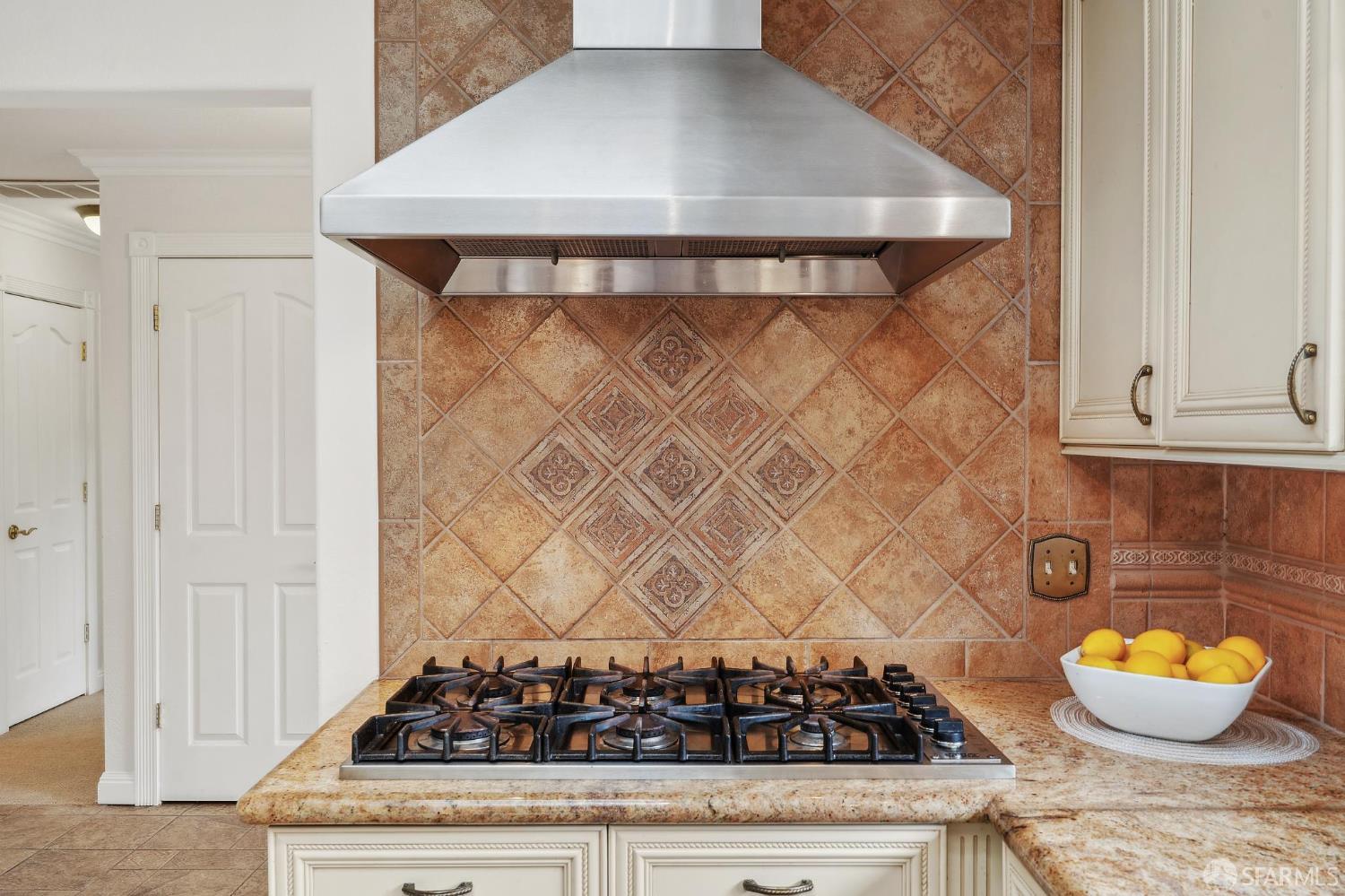375 Montecillo Drive Walnut Creek, CA 94595 - Photo 27 of 79 a stove top oven sitting inside of a kitchen