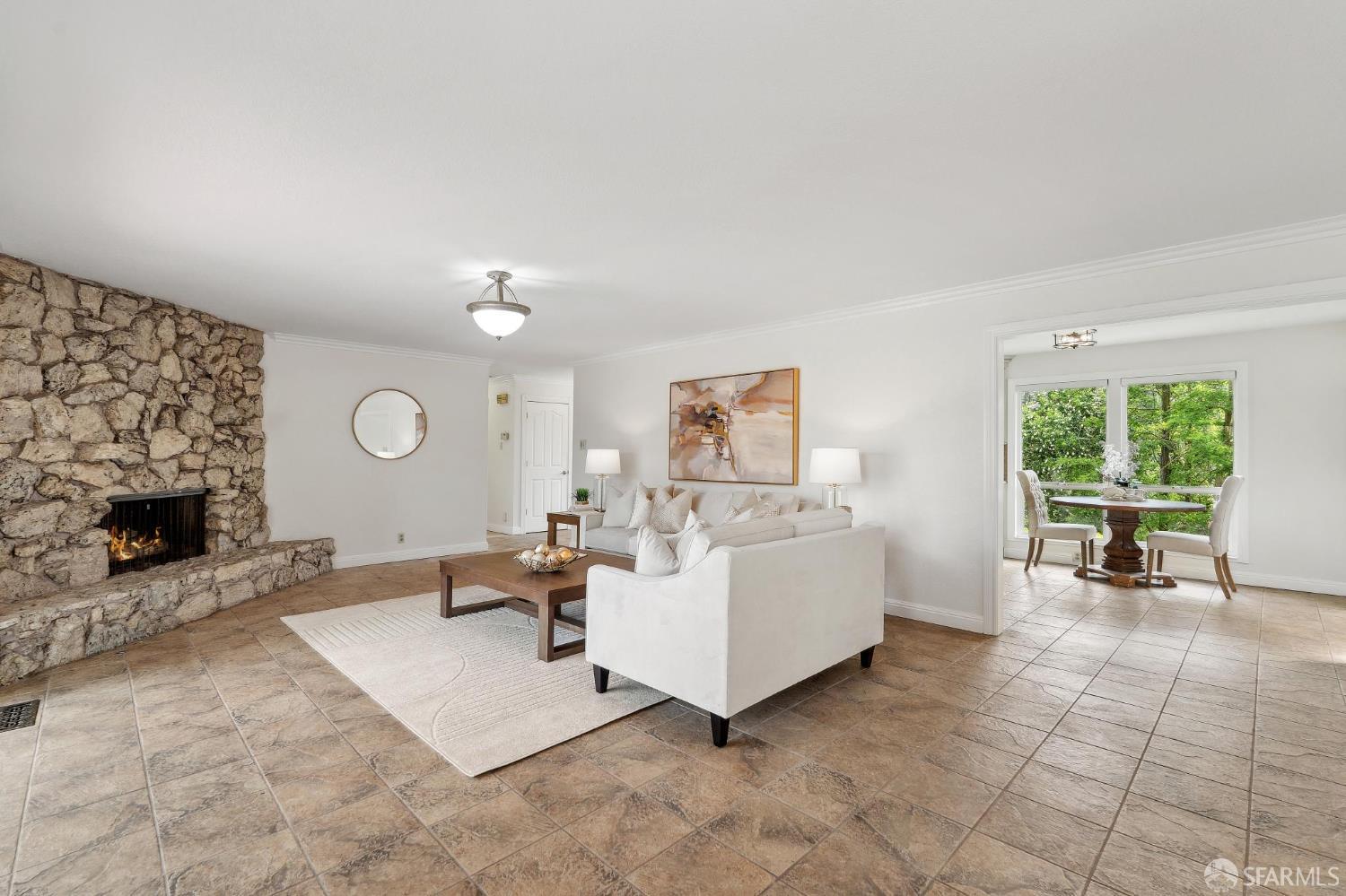 375 Montecillo Drive Walnut Creek, CA 94595 - Photo 31 of 79 a living room with furniture a fireplace and a flat screen tv