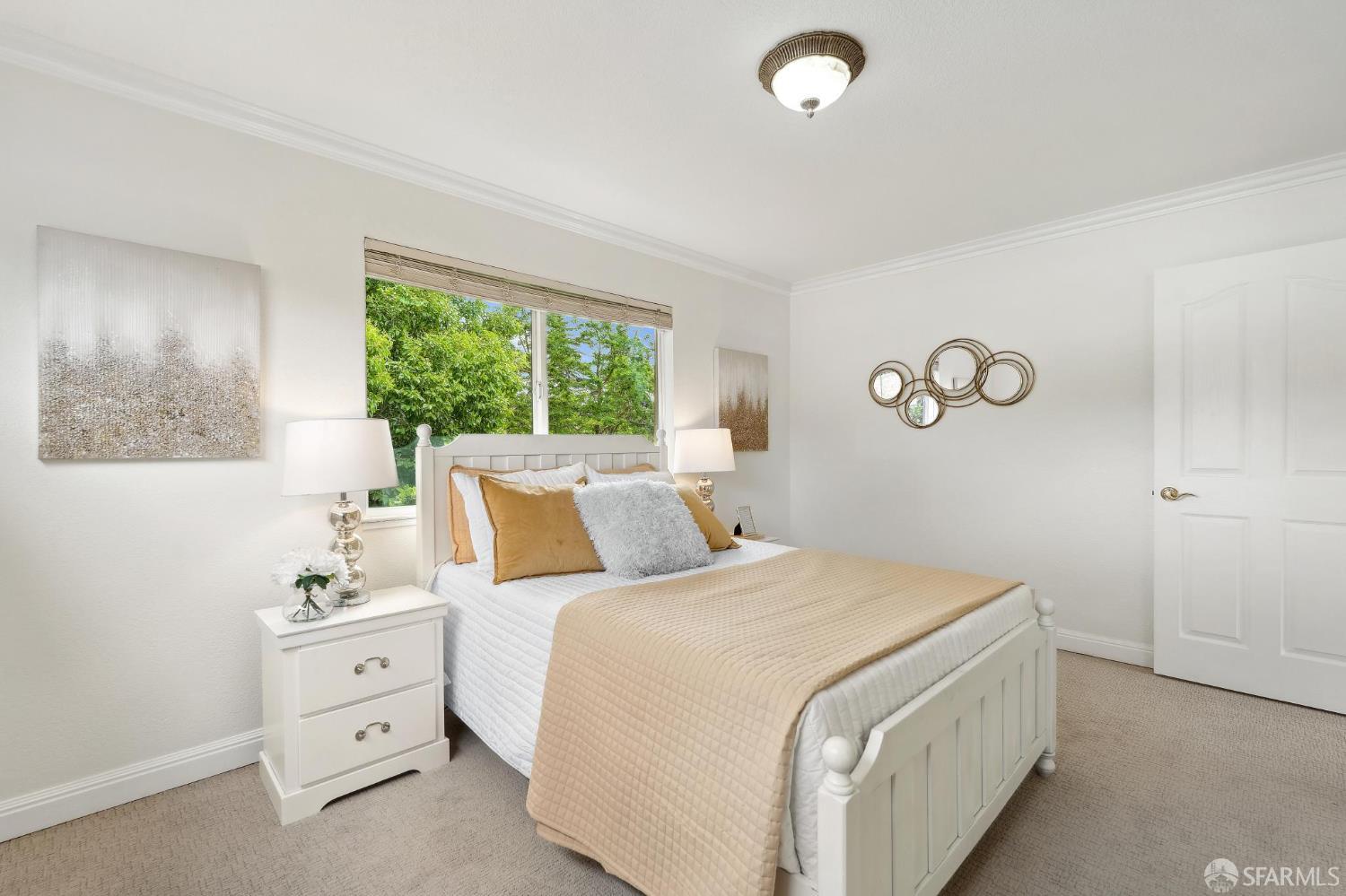 375 Montecillo Drive Walnut Creek, CA 94595 - Photo 36 of 79 a bedroom with a large bed and a window