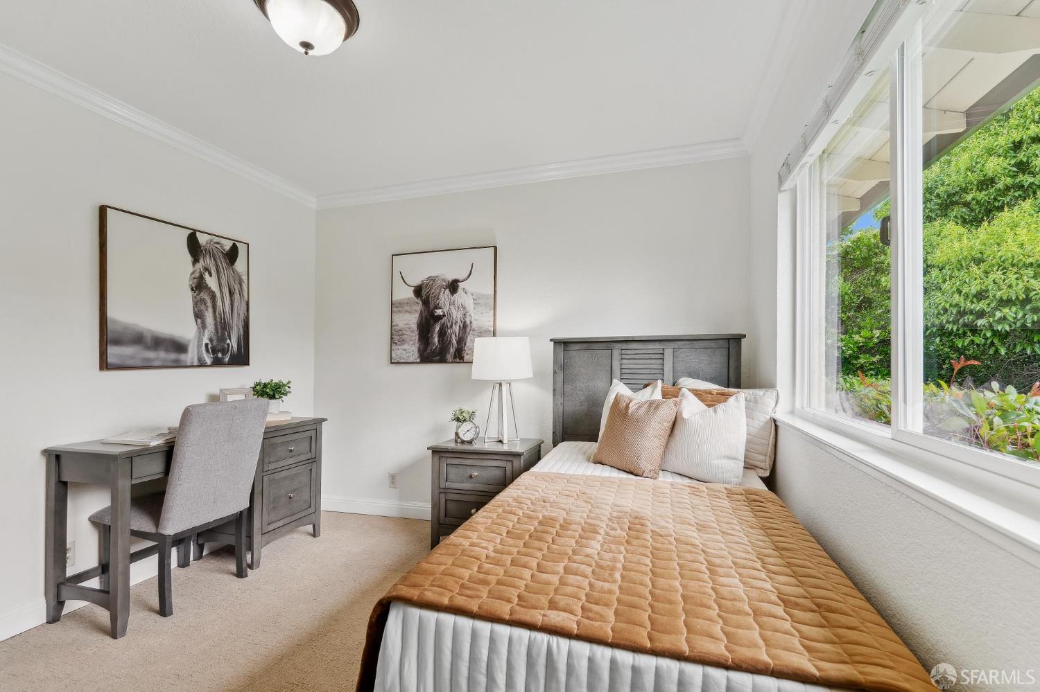 375 Montecillo Drive Walnut Creek, CA 94595 - Photo 38 of 79 a bedroom with a bed a large window with table and chair