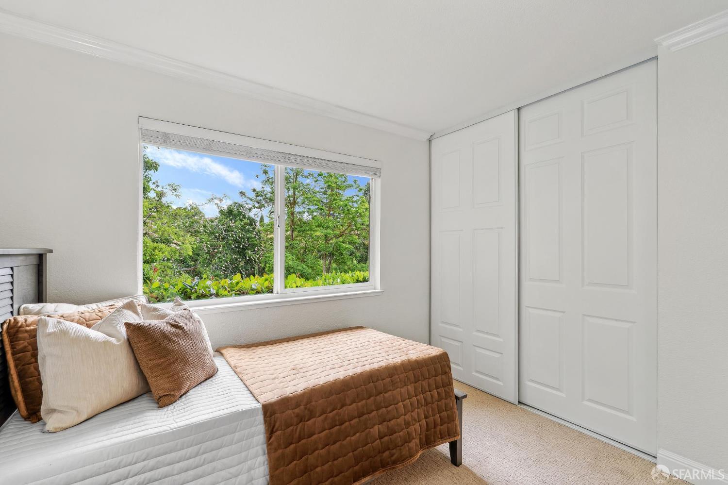 375 Montecillo Drive Walnut Creek, CA 94595 - Photo 39 of 79 a bedroom with a bed and a window