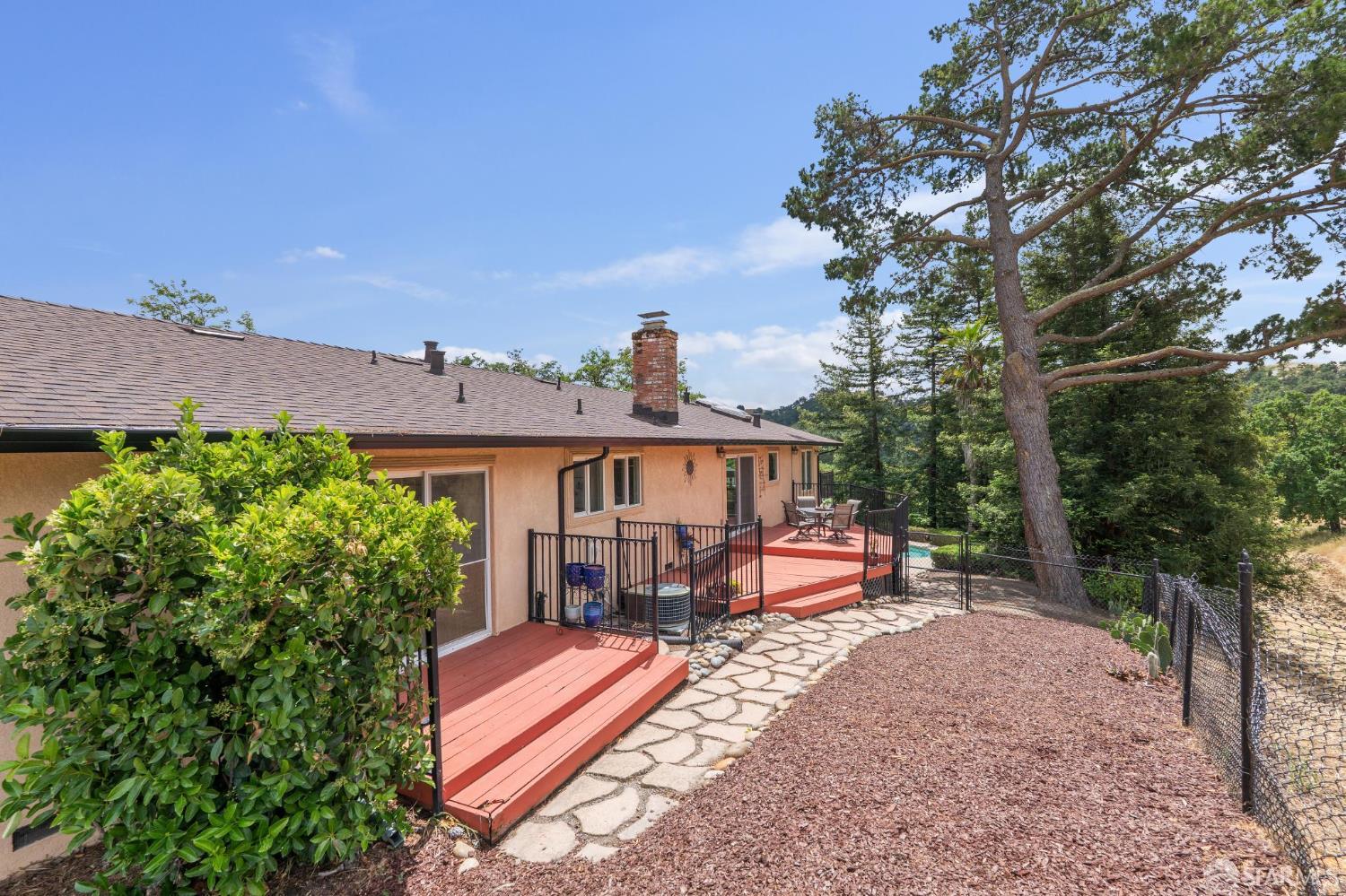 375 Montecillo Drive Walnut Creek, CA 94595 - Photo 46 of 79 a view of a house with backyard porch and sitting area