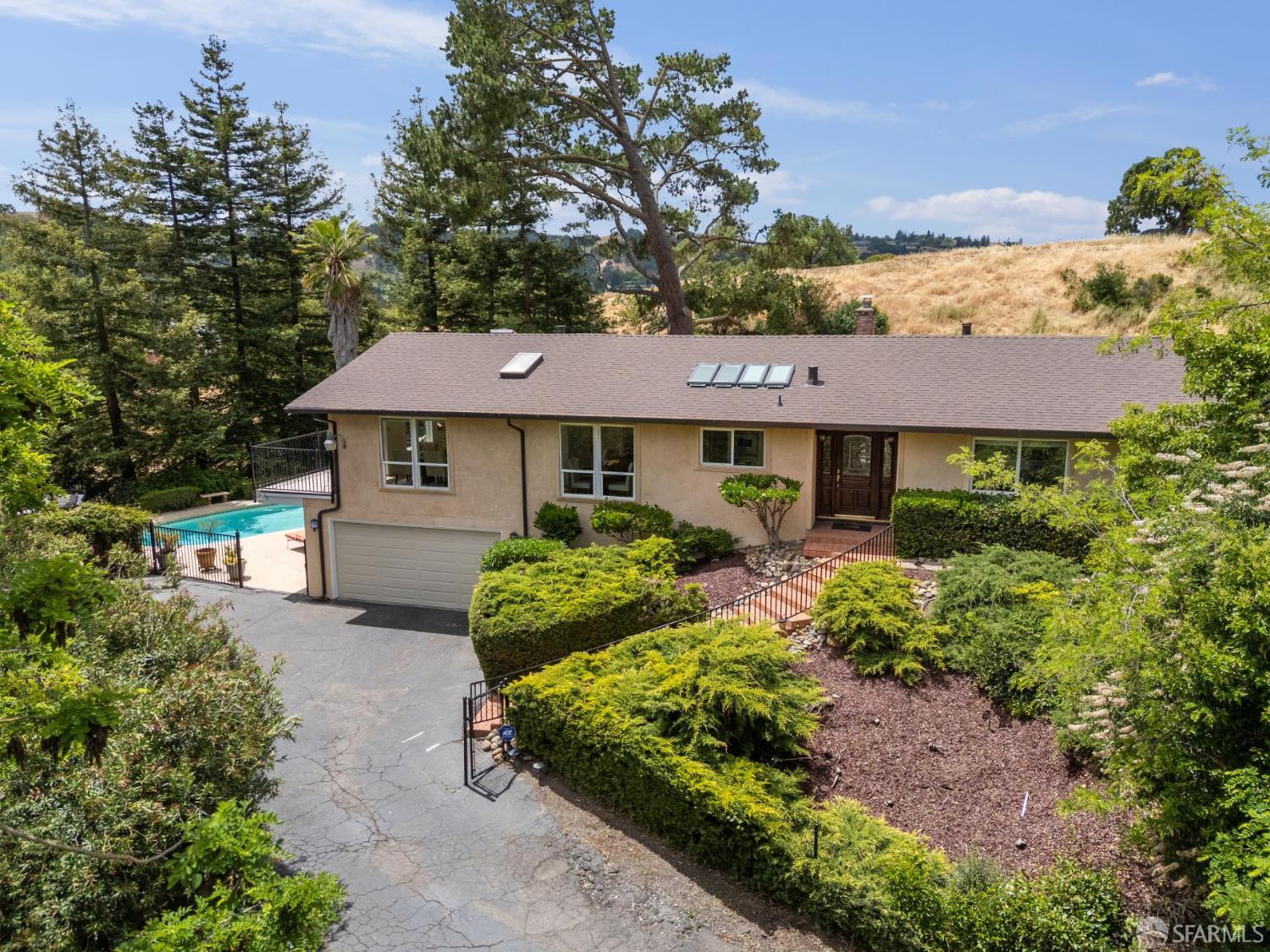 375 Montecillo Drive Walnut Creek, CA 94595 - Photo 5 of 79 a front view of a house with garden