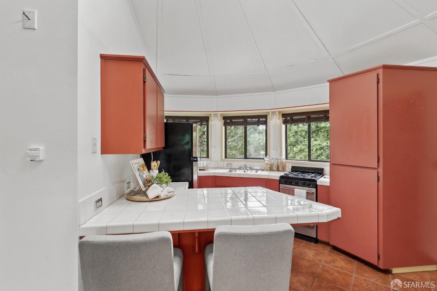 375 Montecillo Drive Walnut Creek, CA 94595 - Photo 57 of 79 a kitchen with a sink and a refrigerator