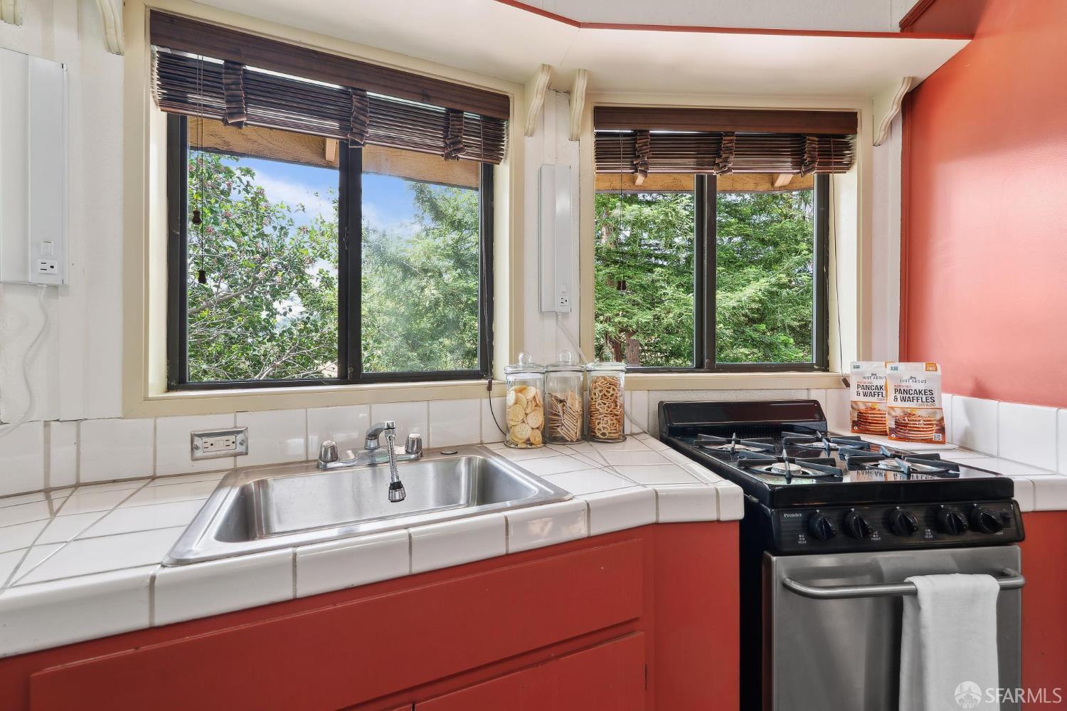 375 Montecillo Drive Walnut Creek, CA 94595 - Photo 58 of 79 a kitchen that has a sink a stove and a table