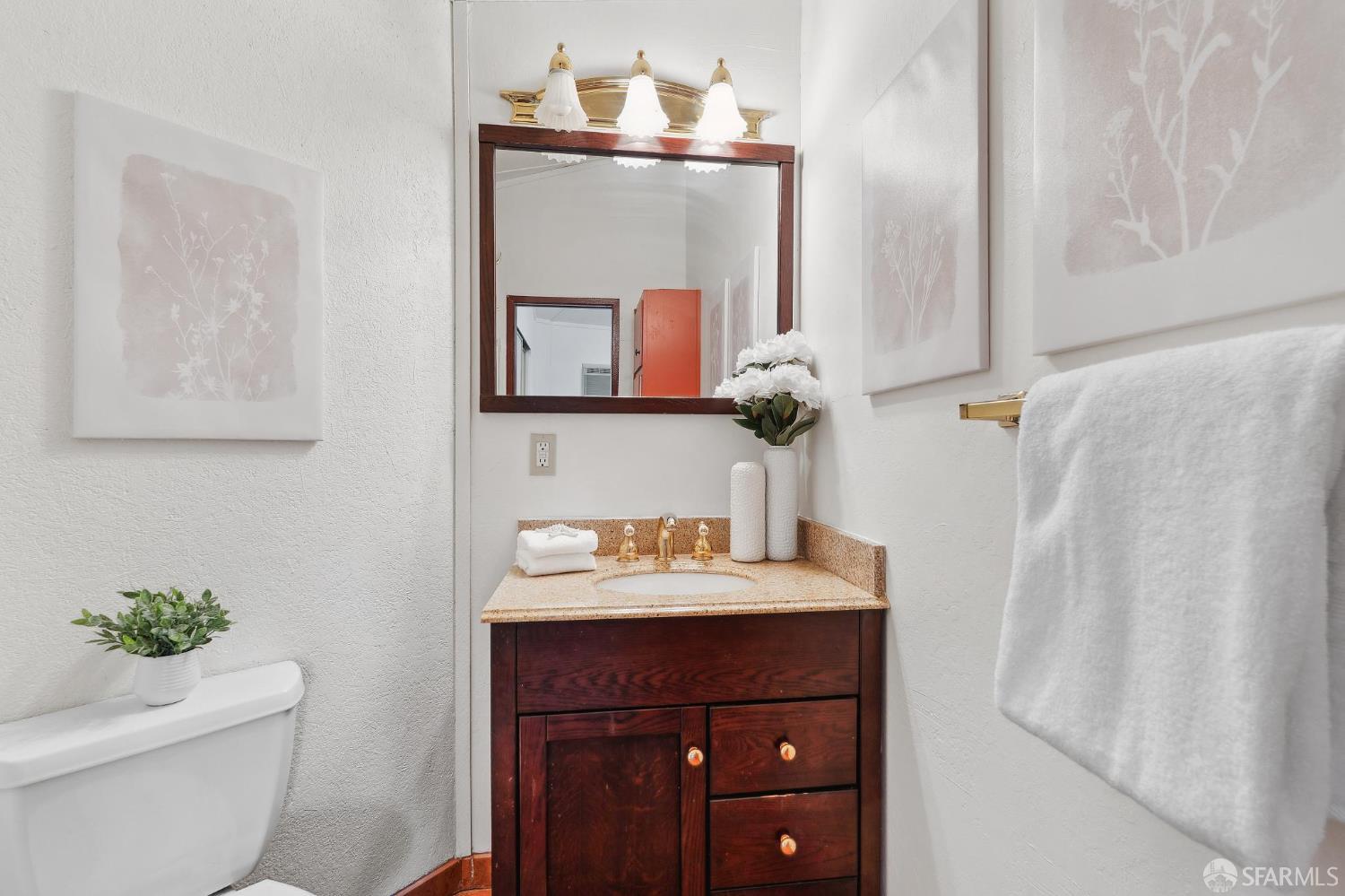 375 Montecillo Drive Walnut Creek, CA 94595 - Photo 59 of 79 a bathroom with a sink vanity mirror and toilet