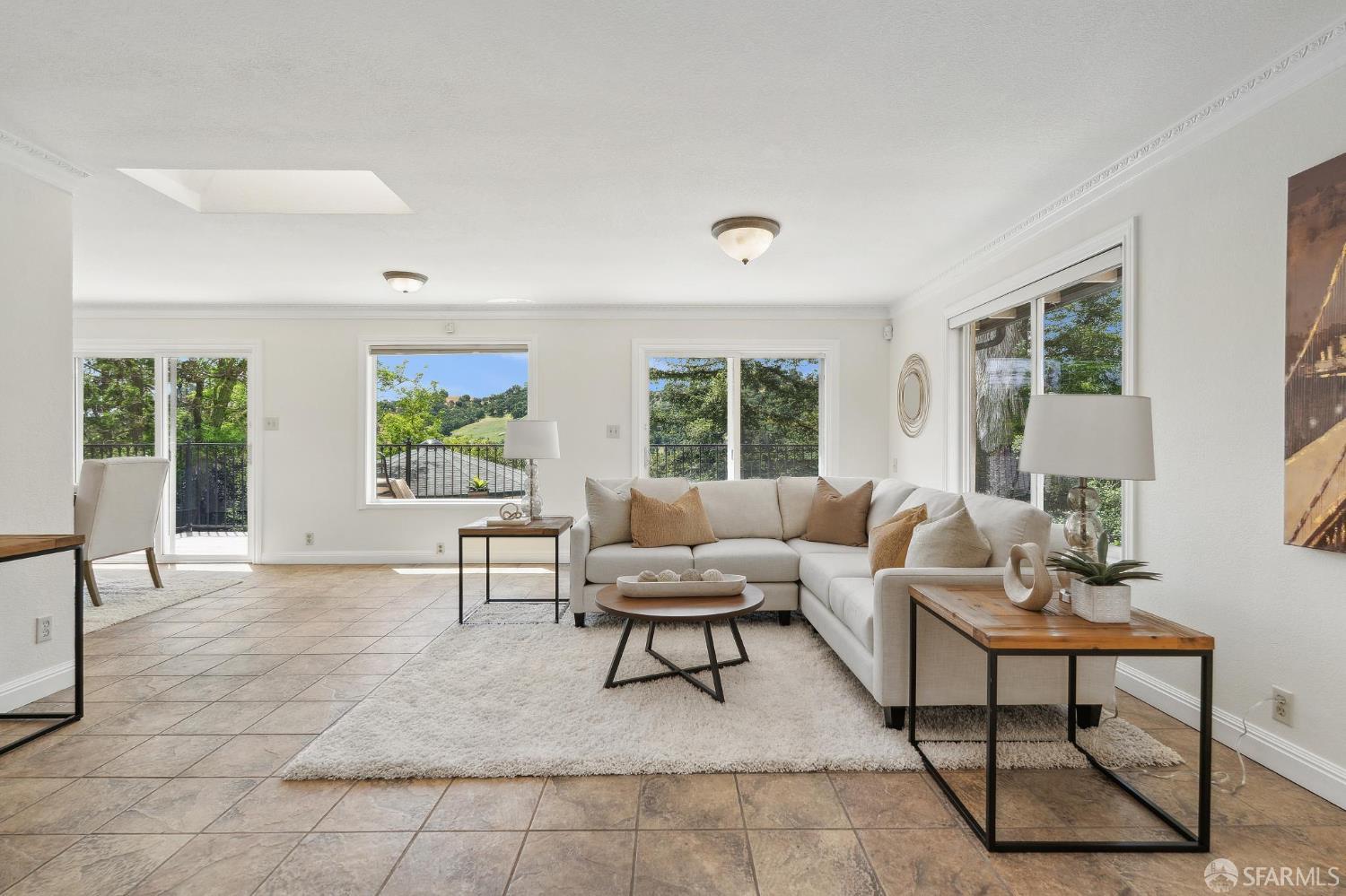 375 Montecillo Drive Walnut Creek, CA 94595 - Photo 10 of 79 a living room with furniture and a large window