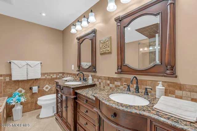 a bathroom with a sink and shower