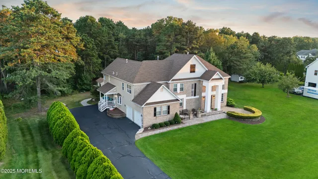a aerial view of a house with garden
