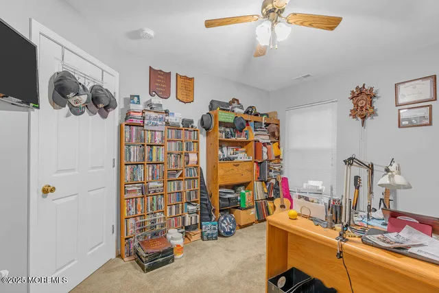 a bathroom with a double vanity sink mirror and shower