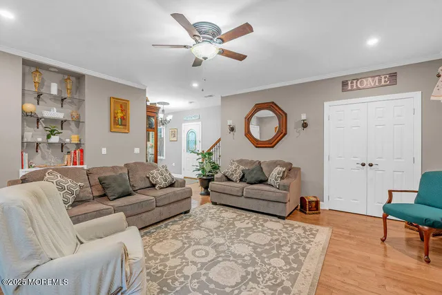 a view of a chair and table on the green field