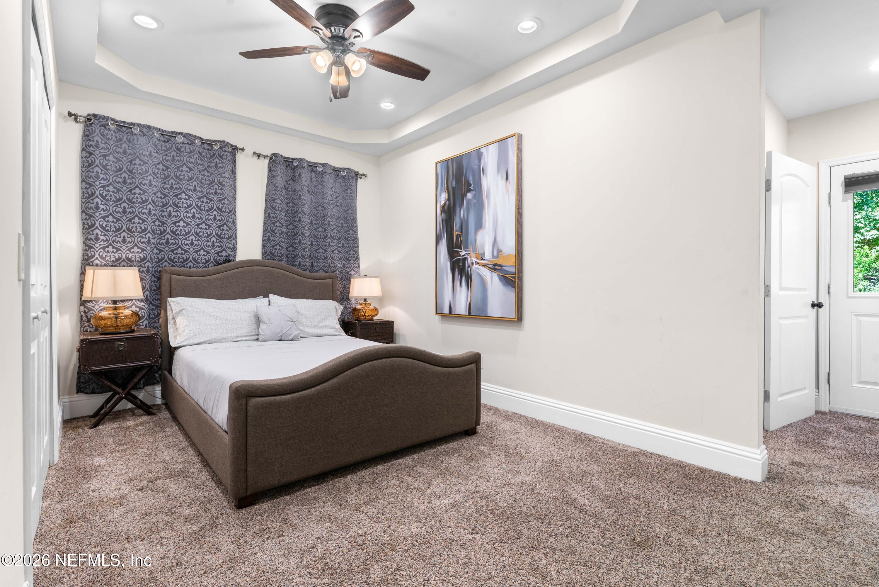 1138 Walnut Street Jacksonville, FL 32206 - Photo 11 of 37 a living room with furniture and window
