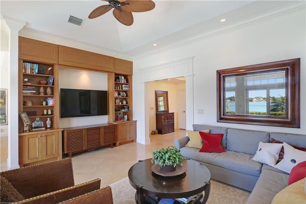 37 West High Point Road Stuart, FL 34996 - Photo 13 of 35 a living room with furniture and a flat screen tv