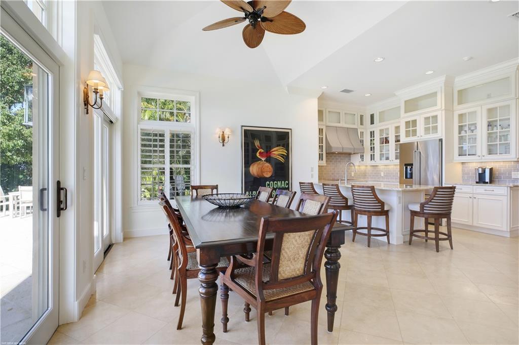 37 West High Point Road Stuart, FL 34996 - Photo 15 of 35 a view of a dining room with furniture window and outside view