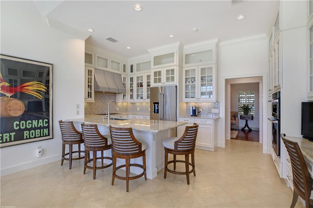 37 West High Point Road Stuart, FL 34996 - Photo 17 of 35 a dining room with furniture and window