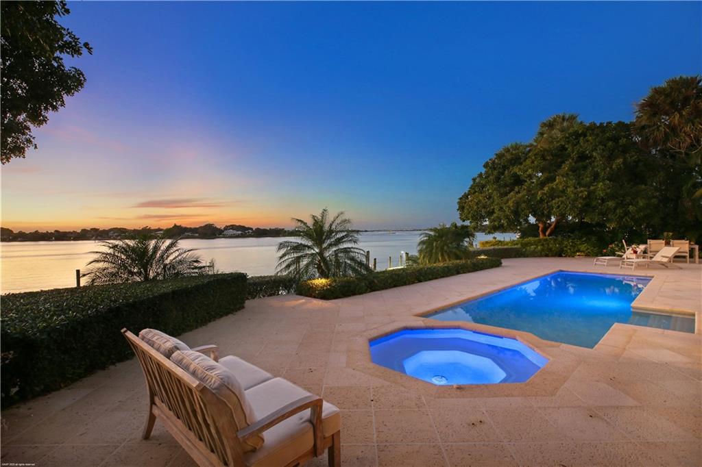 37 West High Point Road Stuart, FL 34996 - Photo 28 of 35 a view of a swimming pool with lounge chair