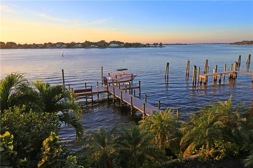 37 West High Point Road Stuart, FL 34996 - Photo 34 of 35 a view of a terrace with a table and chairs
