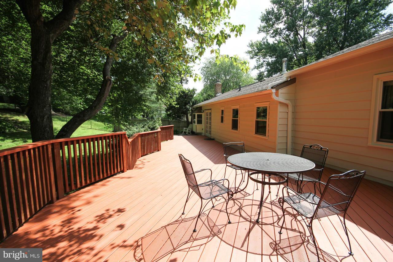 14305 Piccadilly Road Silver Spring, MD 20906 - Photo 30 of 30 a balcony with table and chairs