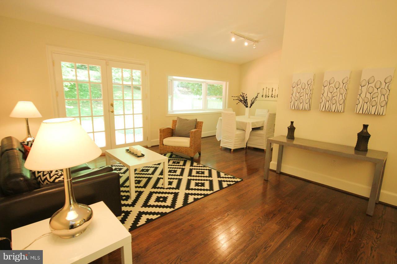 14305 Piccadilly Road Silver Spring, MD 20906 - Photo 5 of 30 a living room with furniture and wooden floor