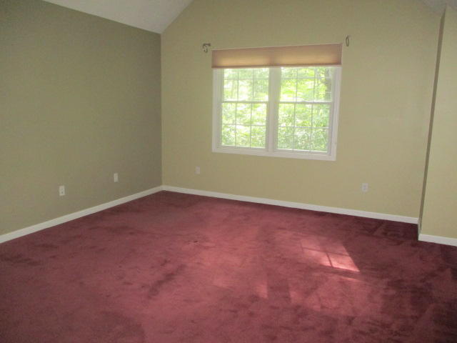 15 Gold Leaf Lane Mashpee, MA 02649 - Photo 12 of 14 an empty room with a window