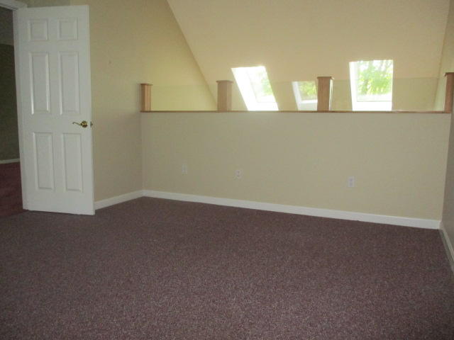 15 Gold Leaf Lane Mashpee, MA 02649 - Photo 10 of 14 an empty room with windows