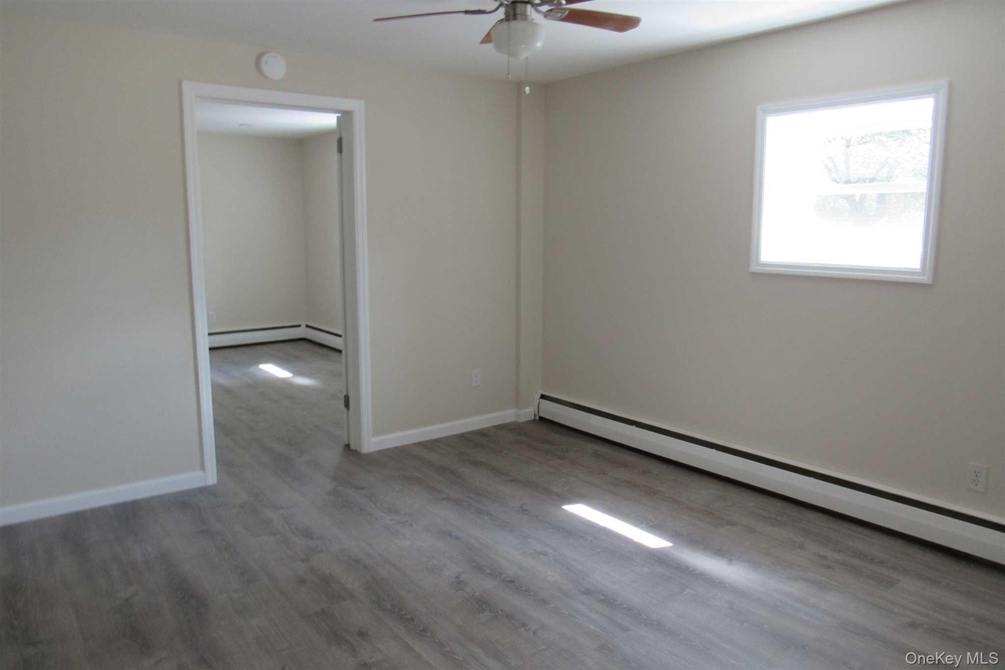 1425 Highway 82, Unit B Hopewell Junction, NY 12533 - Photo 11 of 19 an empty room with a window